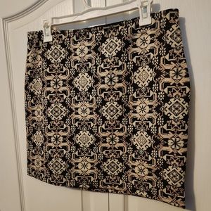 Xhilaration size L gold, black, and light pink patterned mini skirt